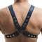 Blue leather harness on a person's back against a white background